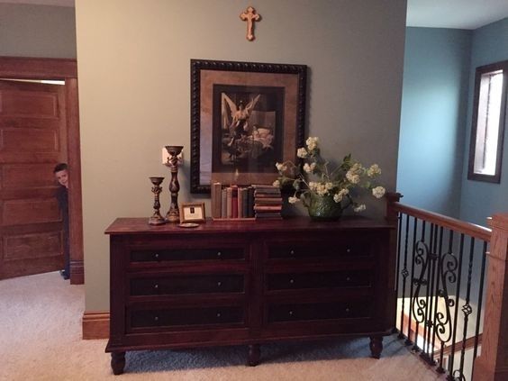 A hallway altar, a beautiful statue or a holy vignette can inspire your children and bring the peace of God to your busy lives.